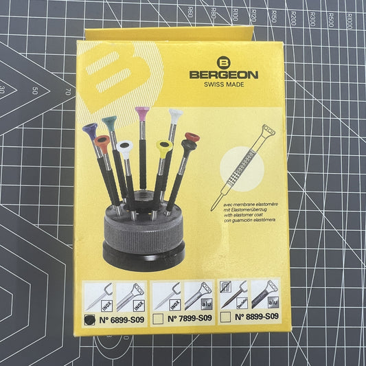 Bergeon 6899-S09 Swiss Made 9-piece stainless steel ergonomic screwdriver set for watch repair precision.