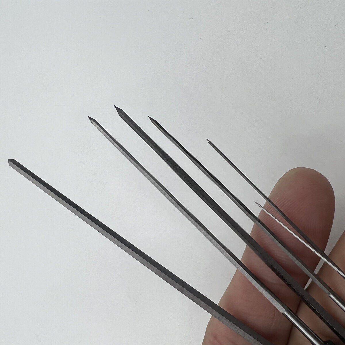 Horotec MSA02.152 assorted cutting broaches set for precise watch movement adjustments and accessory fitting.