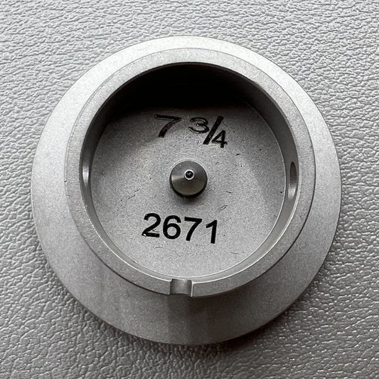 Size 7-3/4 ligne ETA 2671 movement holder with center screw for secure watch repair.