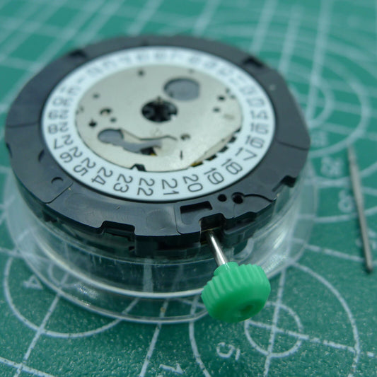 Japan Made Miyota OS20 quartz watch movement with date at 4:30, precision timekeeping by Miyota.