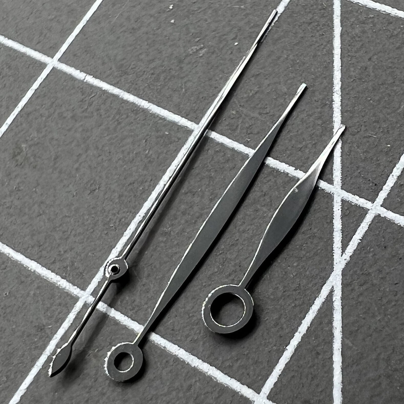 Black polished watch hands set for Tissot 1853 T41 T006 movement, 10.5x16x16mm precision fit.