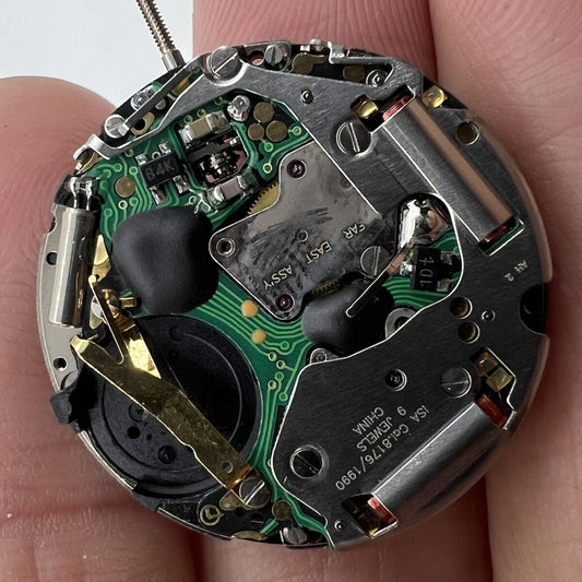 Swiss Made ISA8176A quartz watch movement with white dial, precise and reliable for watch accessories.