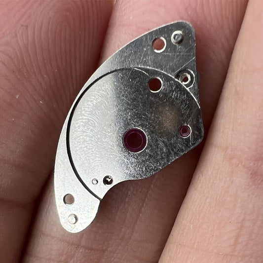 Generic Watch Parts 3135-105 barrel bridge replacement piece for RLX 3135 automatic movement repair.