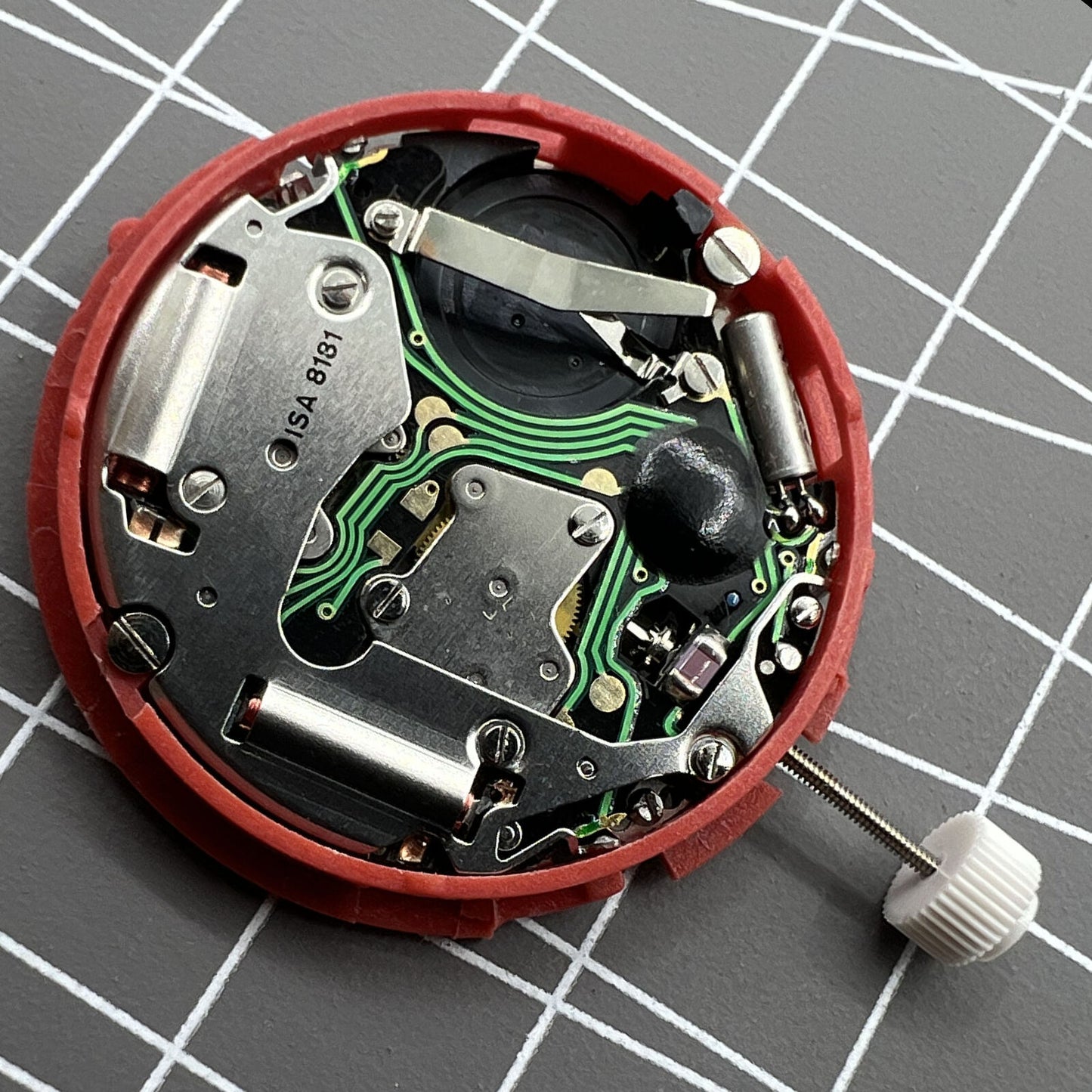 Swiss ISA 8181 quartz watch movement with single calendar and multifunction features for accurate timekeeping.