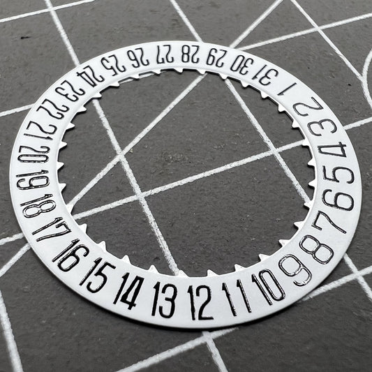 White date disk wheel pair for Miyota 9015 watch movement with date display at 6 o'clock.