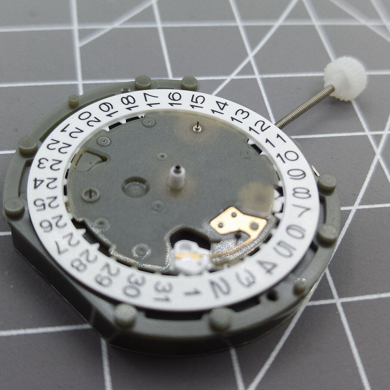 Sunon PE50 quartz watch with 3 hands, date at 3, and small seconds subdials at 2, 6, and 10.