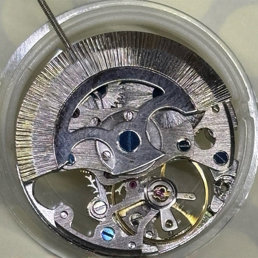 China Made Silver 7120 hollow watch part with automatic mechanical movement and 3 hands for repair.