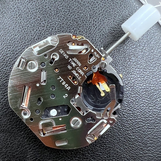 Seiko 7T94A Quartz watch movement close-up showing precise Japanese craftsmanship
