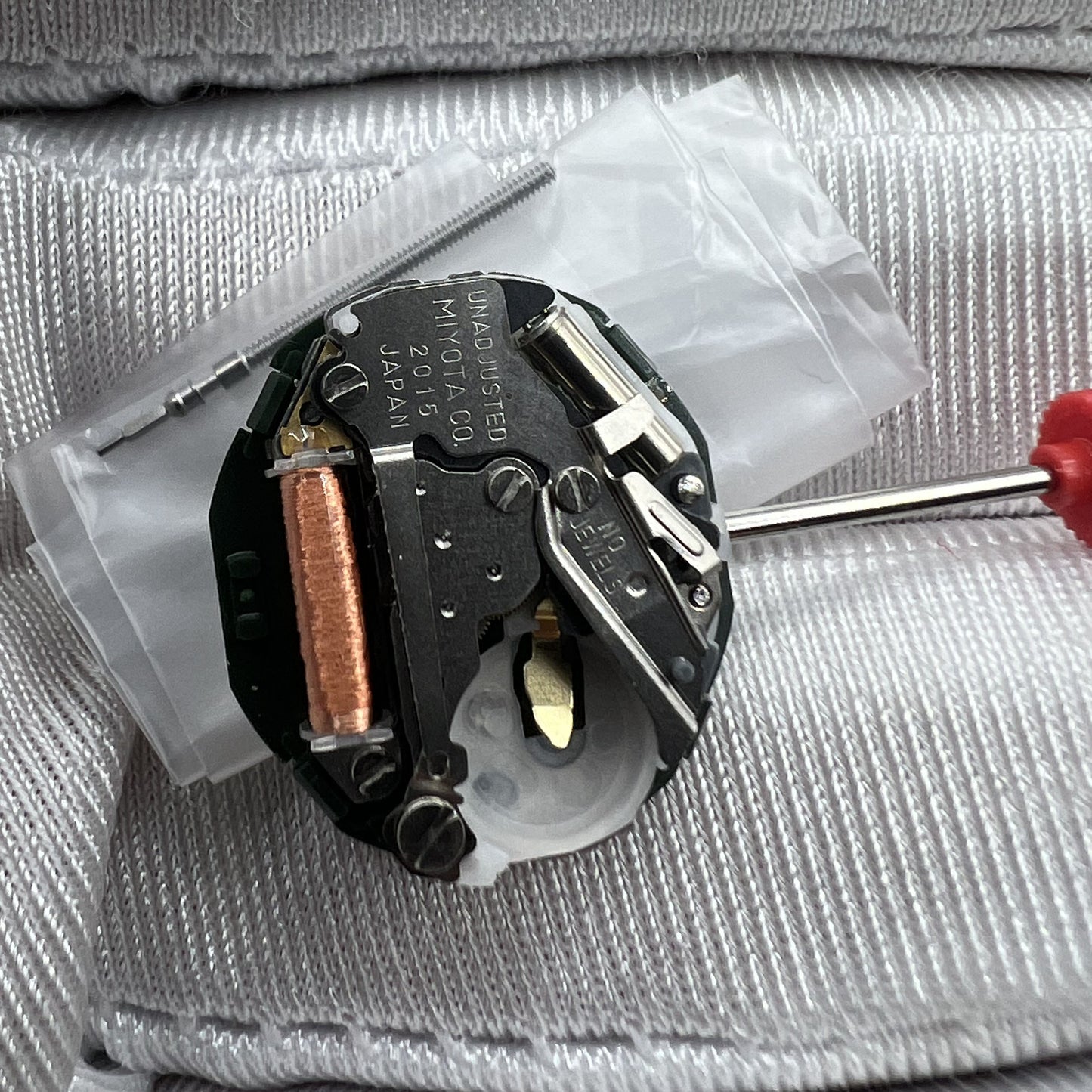 Japan Made Miyota 2015 quartz watch movement with date display, reliable precision by Miyota brand.