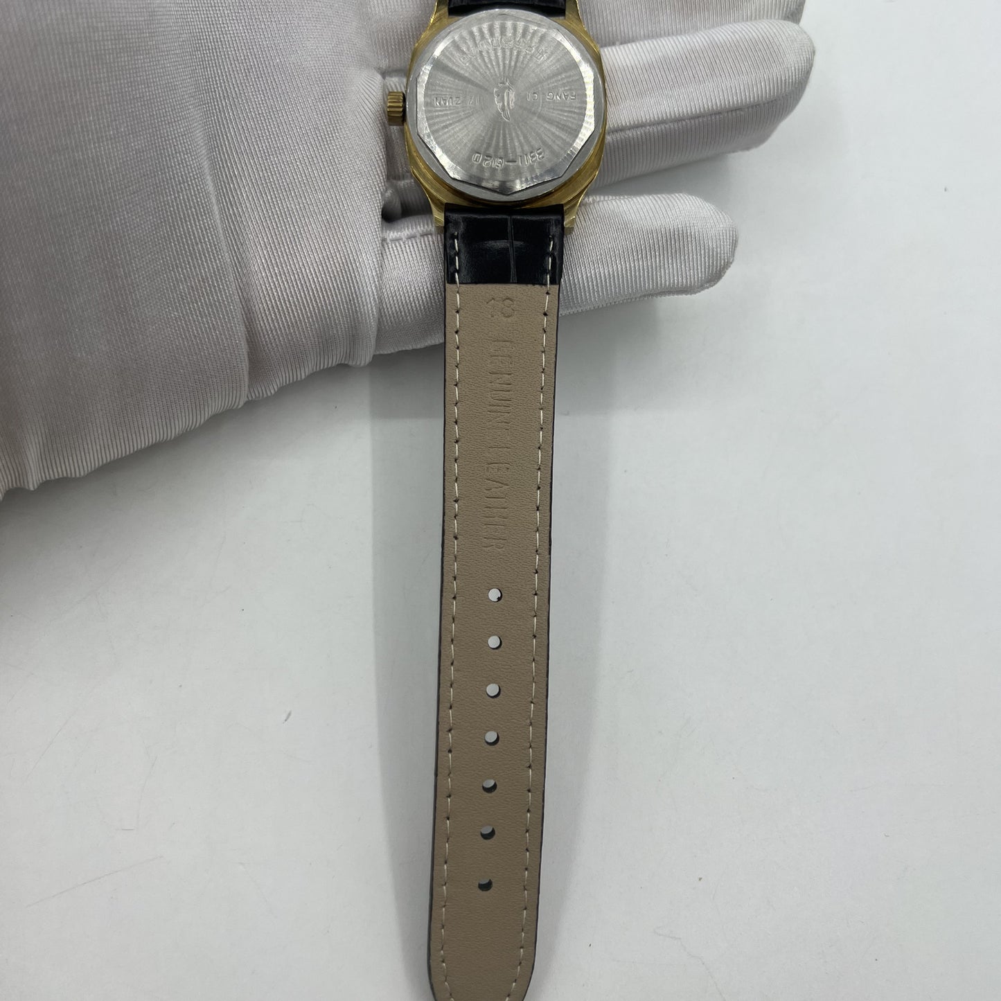 33mm Chunlan China manual steel watch with 17 jewels, silver dial, and matching band for elegant wear.