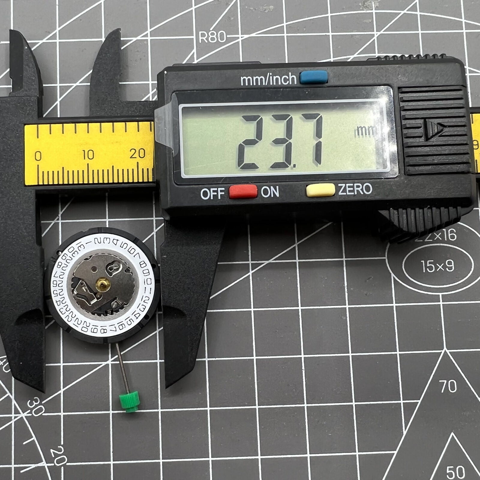 ISA 2330 watch with white dial, quartz movement, date display at 3 o'clock, sleek silver case by ISA.