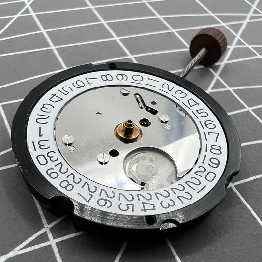 Swiss Ronda 505 quartz watch movement with date display at 3 o'clock, precise timekeeping by Ronda.