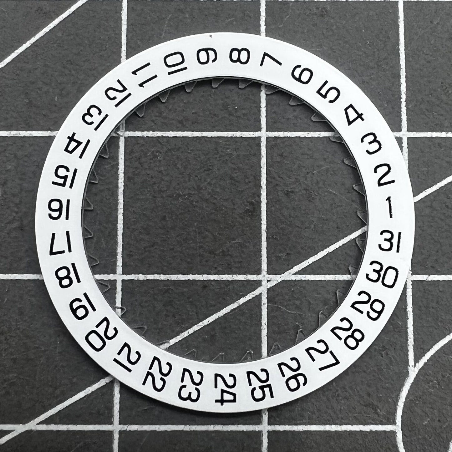 White date disk wheel for ETA C01.211 watch movement, showing date at 3 o'clock position.