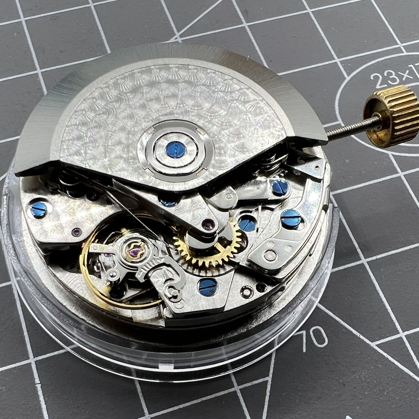 Black Dandong 7753 automatic watch with small second at 9 o'clock, showcasing elegant mechanical movement detail.