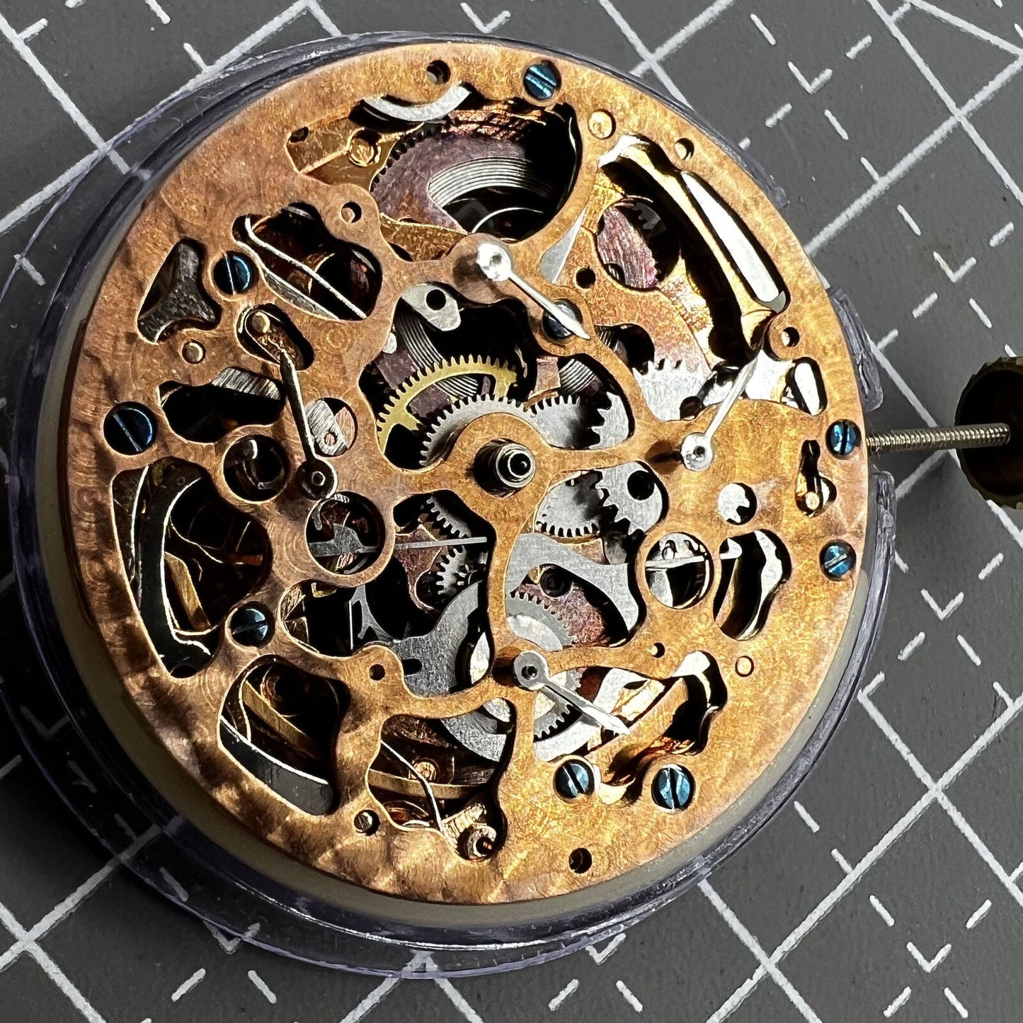 Rose gold hollow watch with mechanical movement, 4 subdials, and 7 hands for precise timekeeping