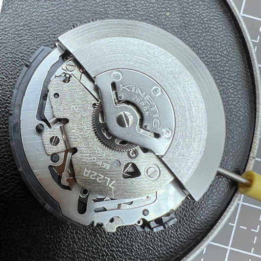 Seiko 7L22A quartz watch movement replacement for precise timekeeping.