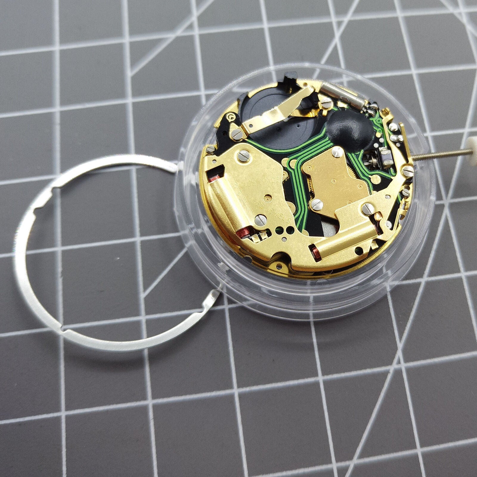 Swiss Made ISA 8171 quartz watch movement with date function at 6 o'clock, precision multifunctional accessory.