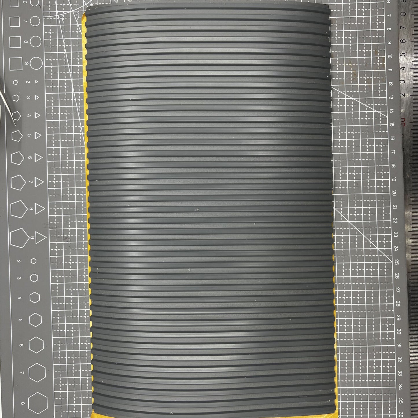 Swiss Bergeon grooved bench mat for watch repair, self-adhesive and durable work surface.