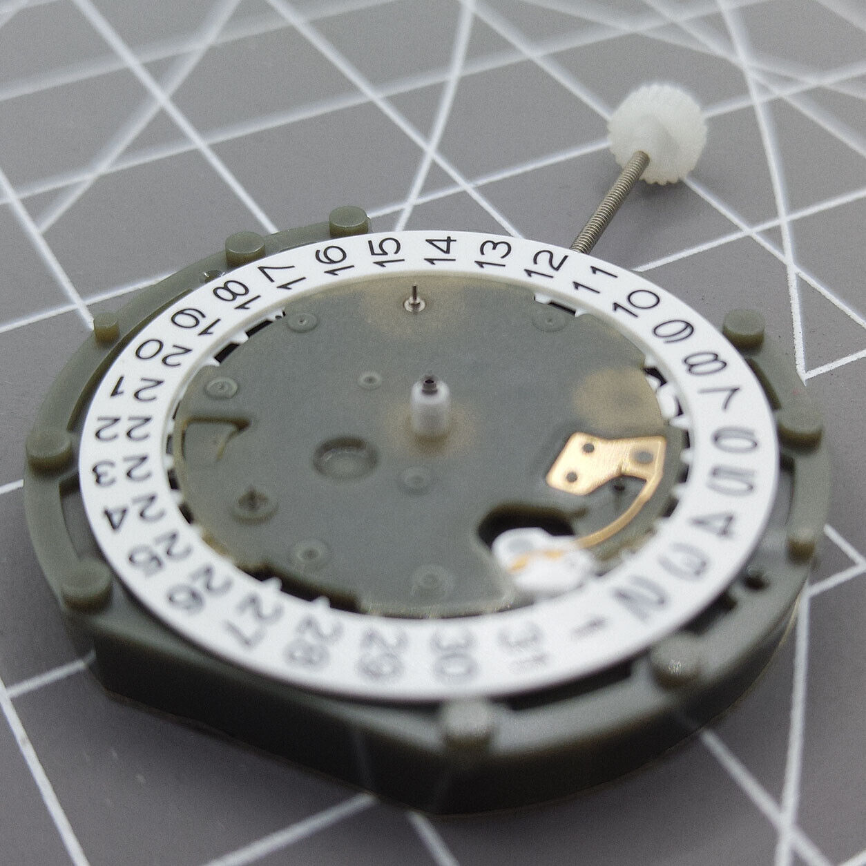 Sunon PE50 quartz watch with date at 3 and small seconds at 2, 6, and 10 positions.