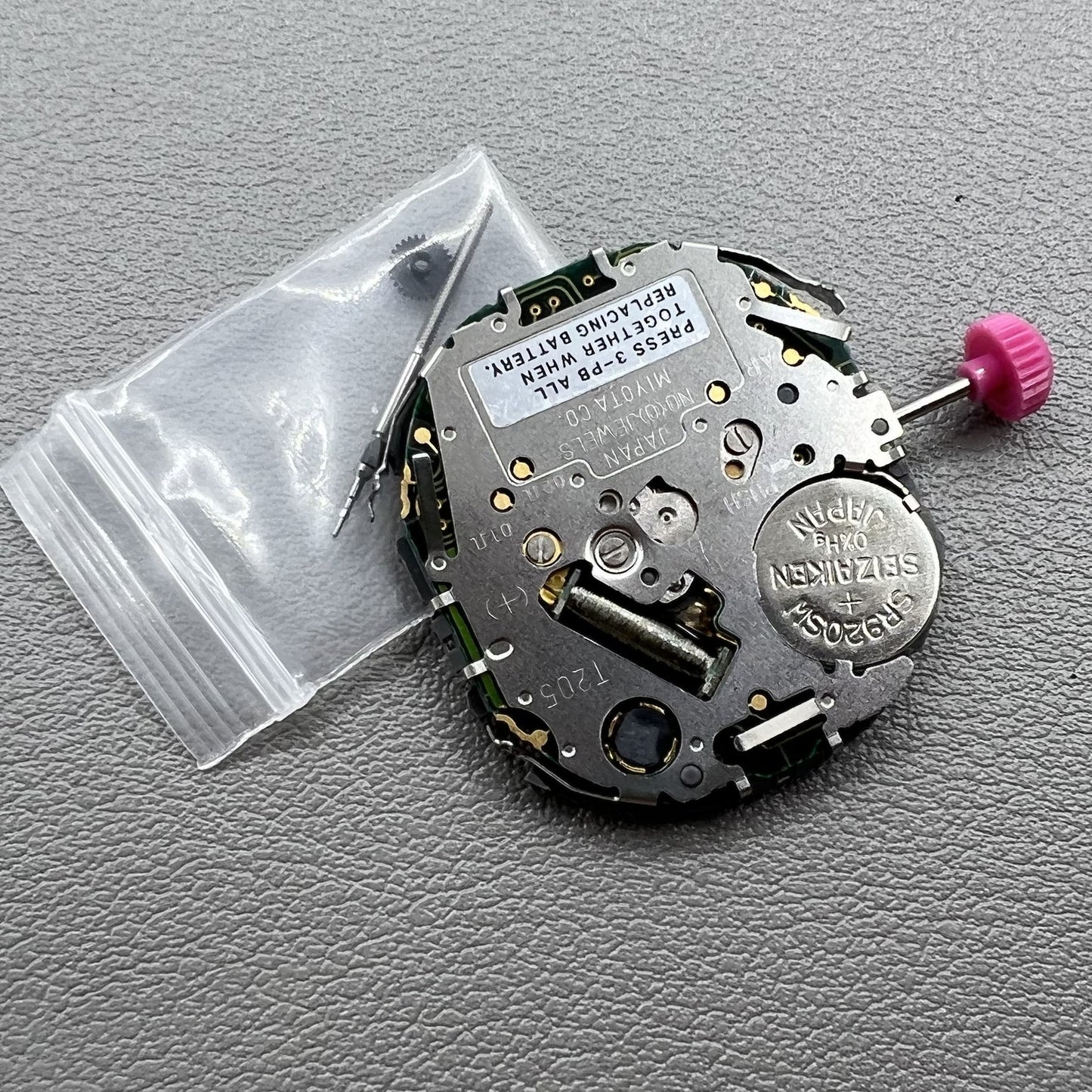 Miyota T205 quartz watch movement showcasing precise timekeeping with display window for easy reading.
