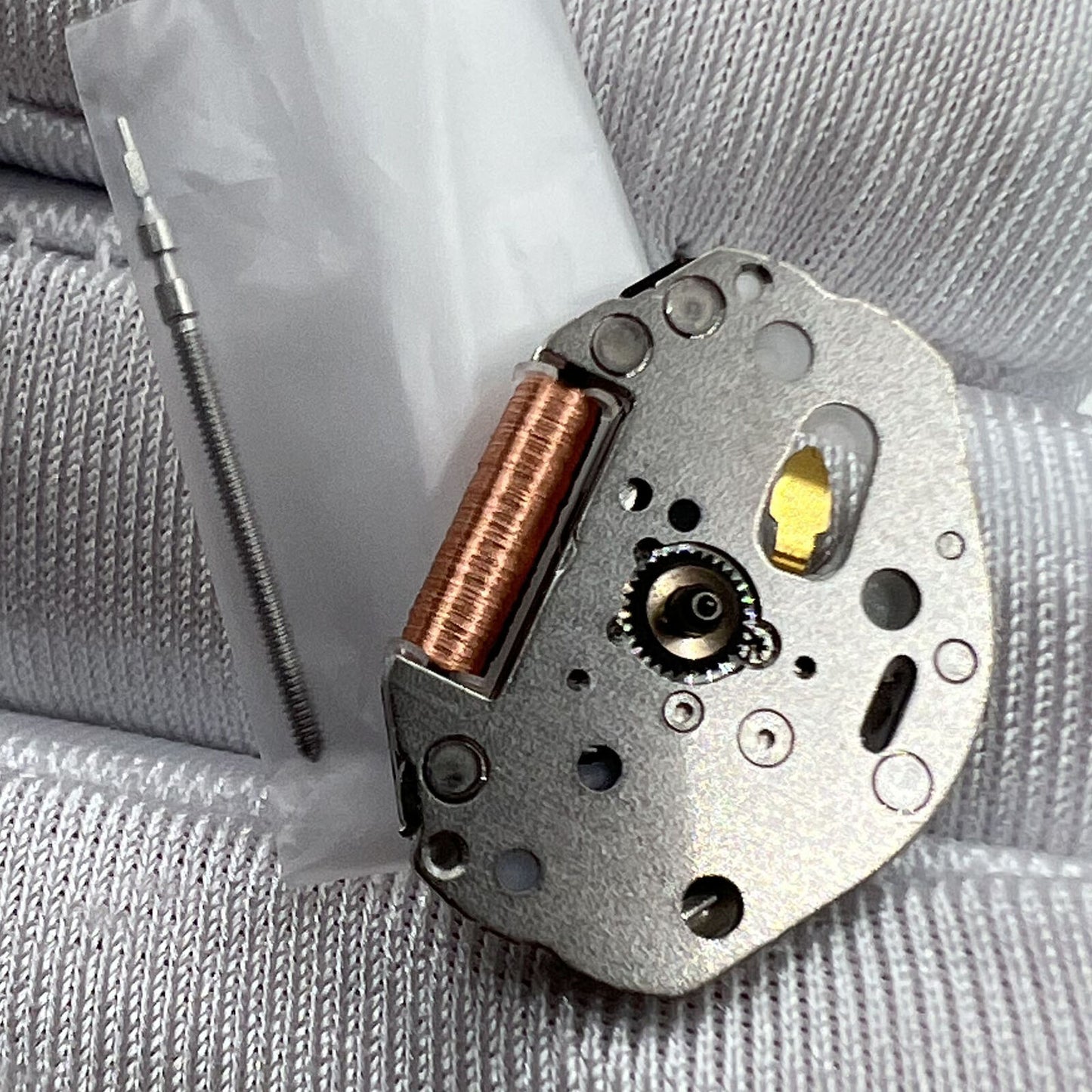 Japan Made Miyota 2035 quartz movement with 3 hands and watch stem for precise timekeeping.
