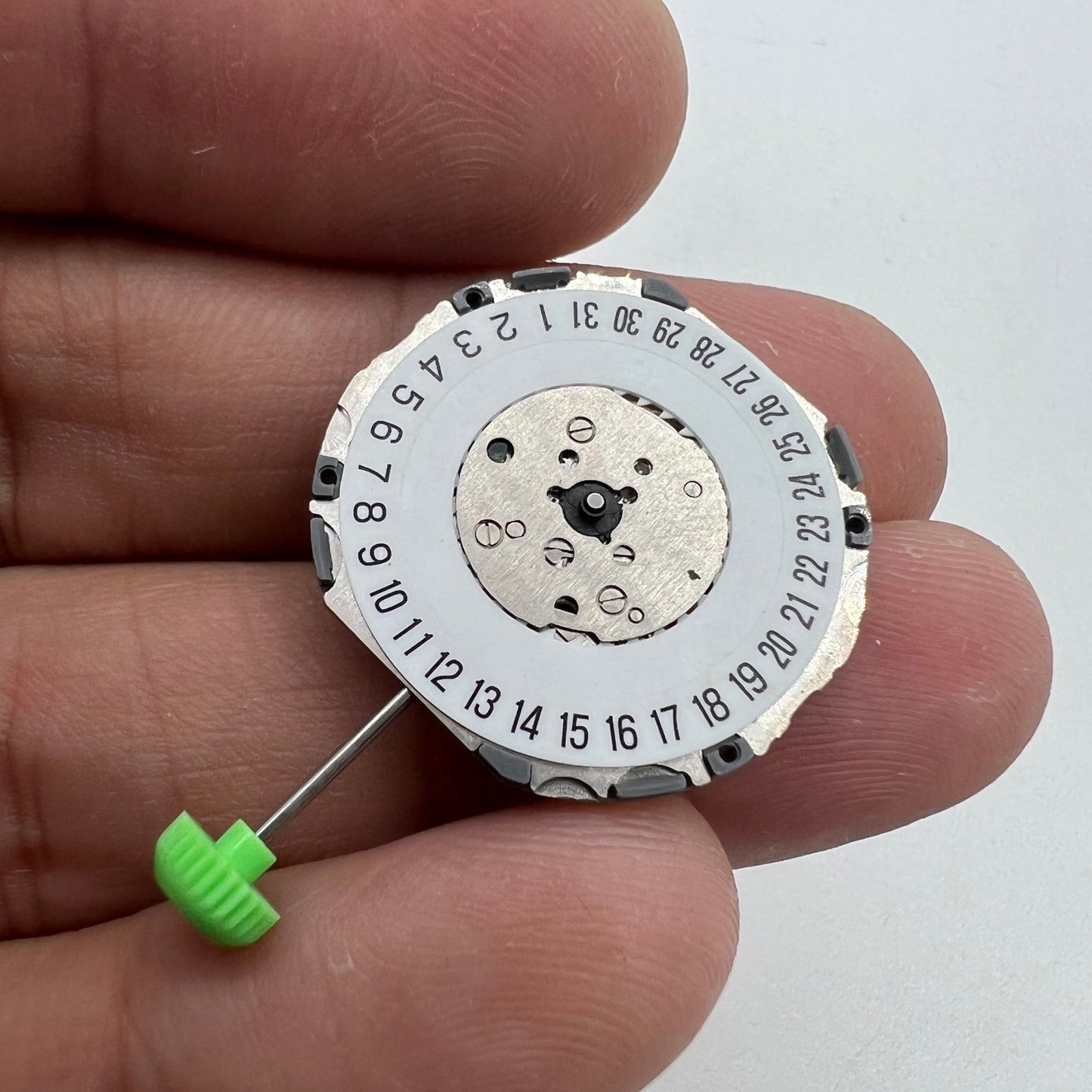 Miyota 4U74 Japan-made quartz movement with date display at 6 o?clock, ideal for watch repairs.