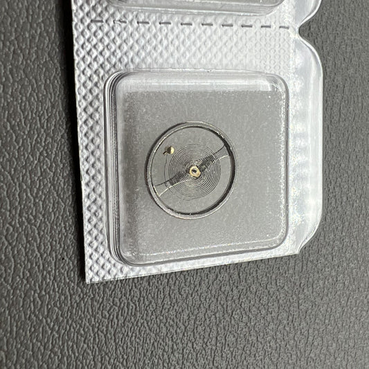 1. China Silver balance wheel set for 7009 movement, precision watch accessory.