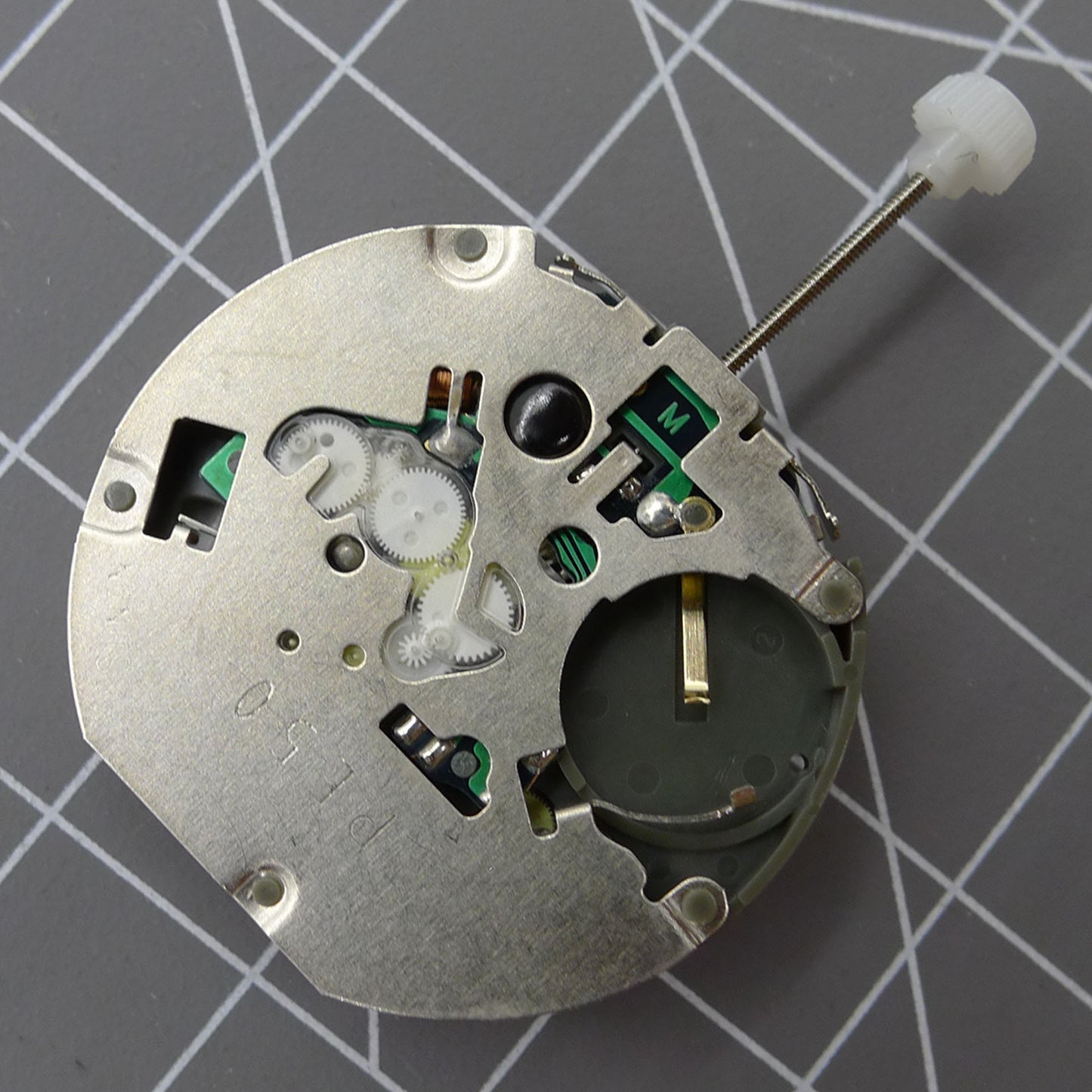 SUNON PE50 quartz watch movement featuring small second hand and date display at 3 o'clock for precise timekeeping.