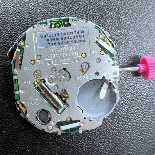 Japan Miyota T201 quartz watch movement showing precise timekeeping and clear display panel.