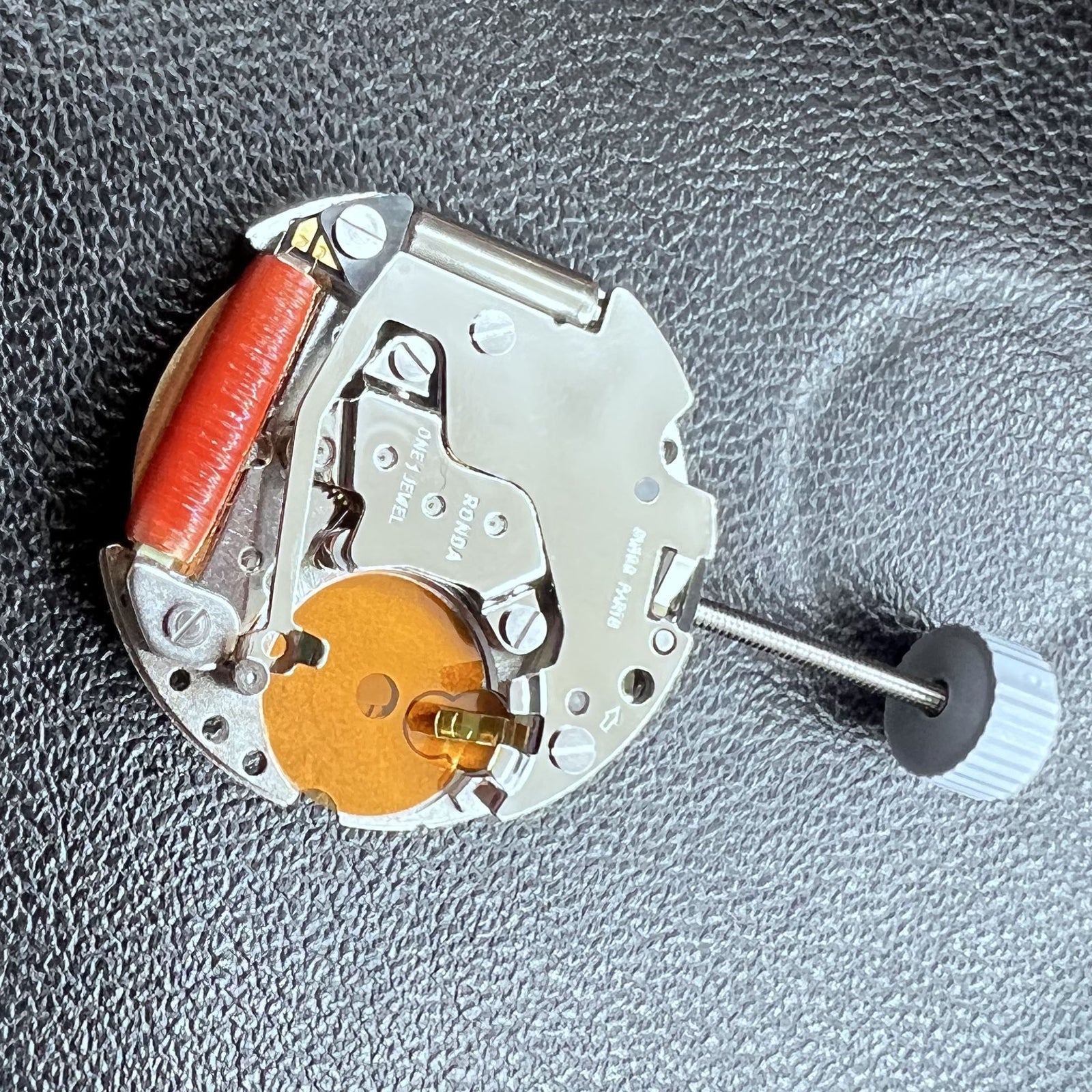 Swiss Ronda 775 quartz watch movement with date display at 6 o'clock, precise timekeeping by Ronda.