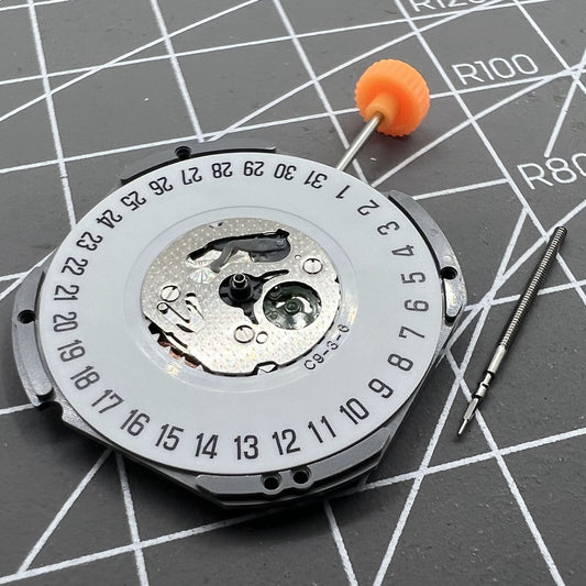 Japan Made Miyota 1S13 quartz watch movement displaying date at 6 o'clock, precise timekeeping by Miyota.