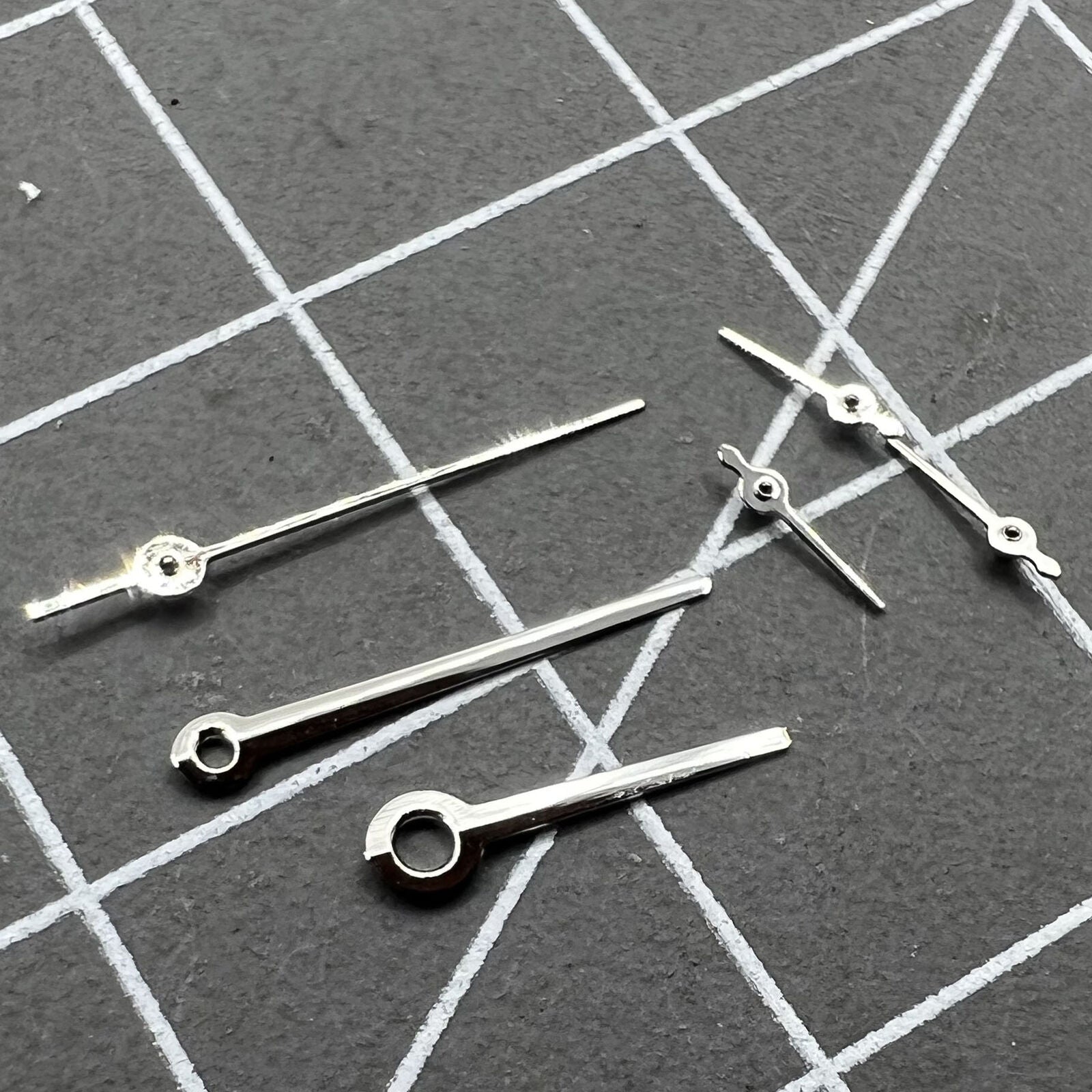 Silver 10.5mm watch hand with trim, fits VX3J VX9J VX7J movements, no lume finish.