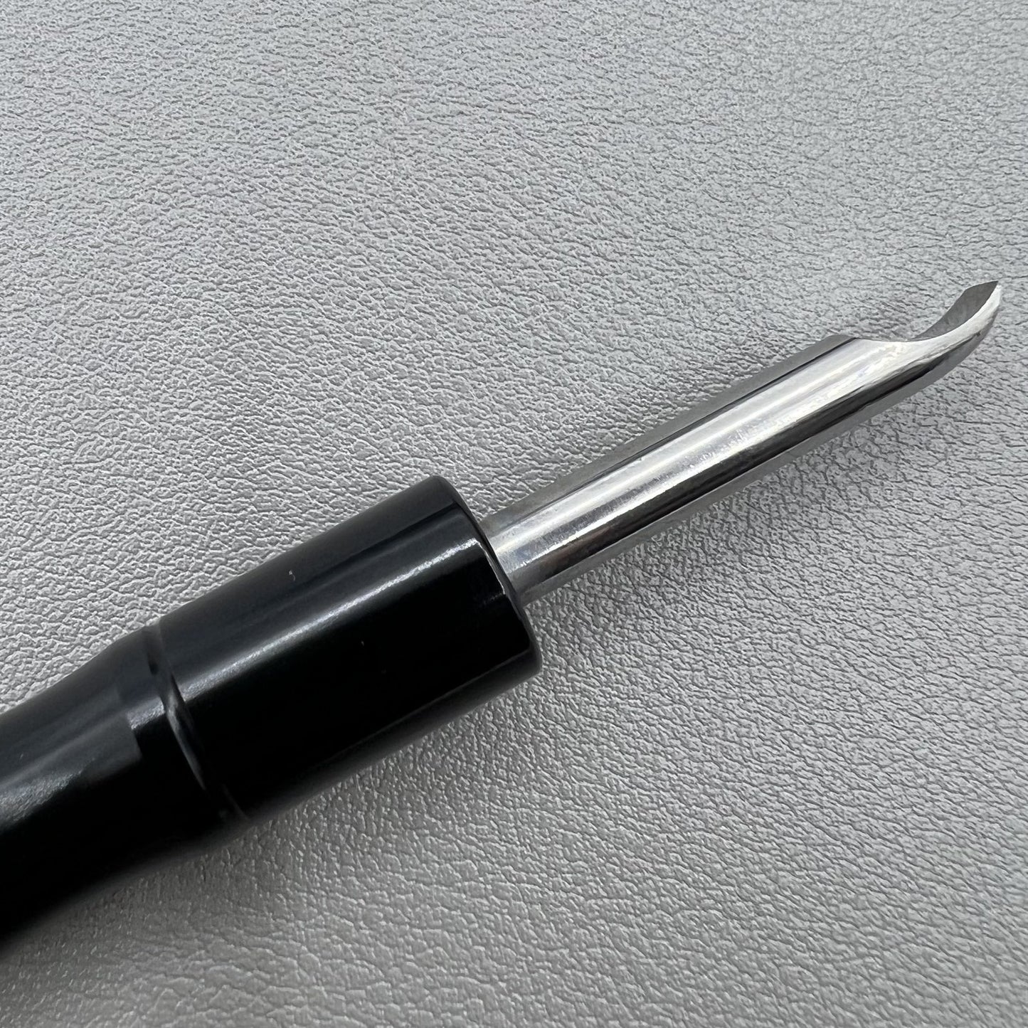 Black Snap Watch Caseback Opener, durable tool for quickly opening snap-on watch backs.