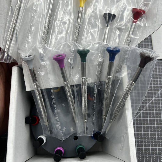 Swiss Bergeon 30081-S10 ergonomic screwdriver set with rotating stand for precise watch accessory repairs.