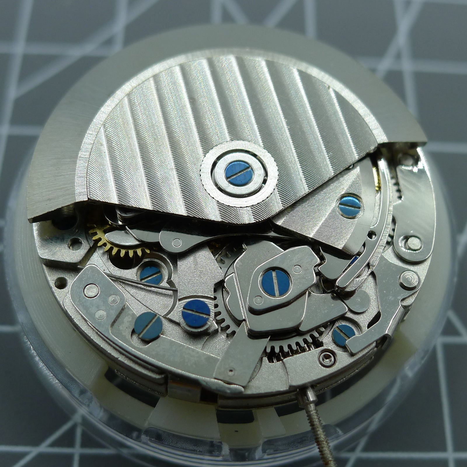 Close-up of ETA 7750 chronograph watch movement with automatic day-date function at 3 o'clock by ETA.