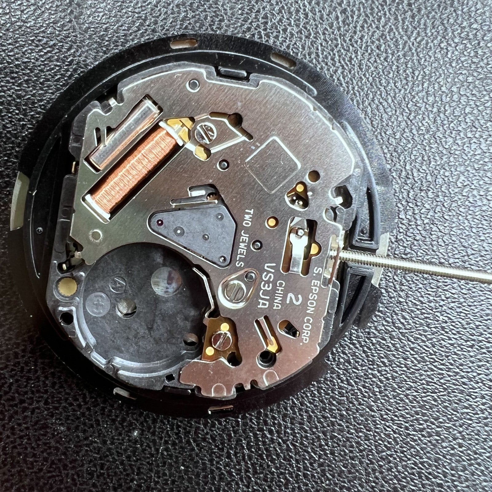 Japan VS3JA quartz watch movement for precise timekeeping with eco-drive solar power technology.