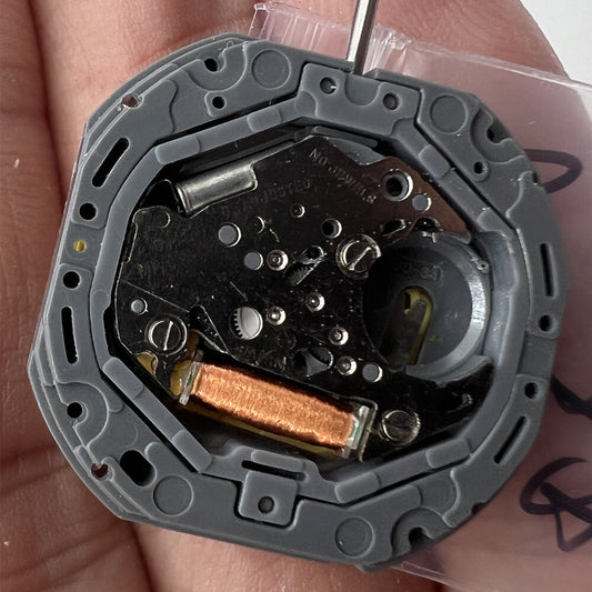 Miyota 6M50 Japan quartz movement watch with golden dial, date at 3, 3-hand display, precise timekeeping.