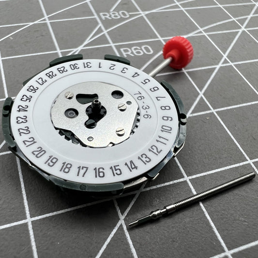 Miyota 2115 quartz movement with date display at 6 o'clock, precise watch accessory component.