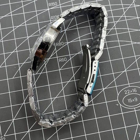 Silver 32mm Shanghai Factory manual mechanical watch with 19 jewels, shock-resistant design for durability.