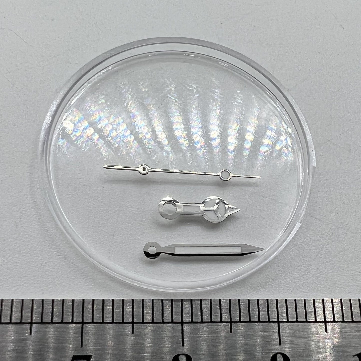 Green luminous 12mm watch hands with silver trim for Miyota NH35/NH36/NH38 movements.