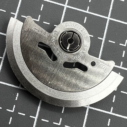 Rotor oscillating weight for NH35 movement, precision spare part enhancing watch performance.