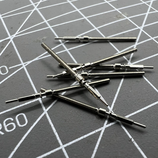 Watch winding stem for China Made 7120 movement, durable replacement part for precise time adjustment.