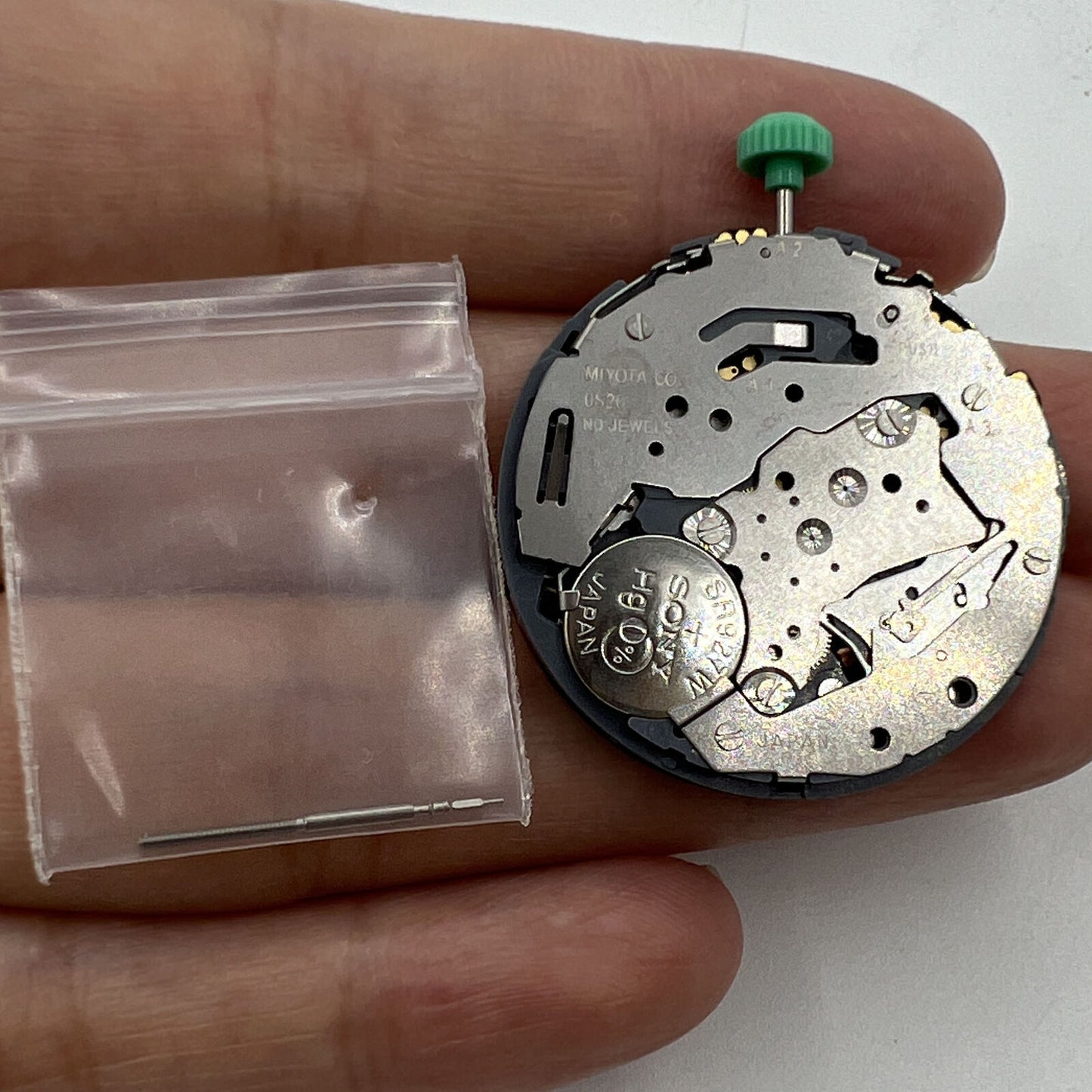 Japan Miyota OS20 quartz watch movement displaying date at 4:30, precise and reliable for watchmakers.