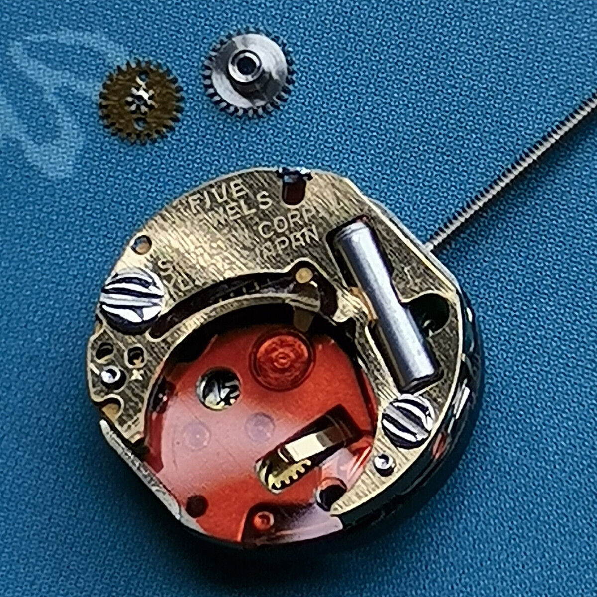 Epson YL50A quartz watch movement with 5 jewels and 2 hands, Japan-made for precise repairs.