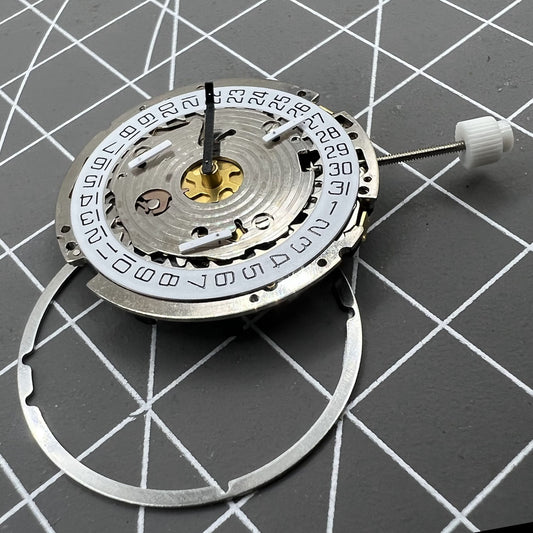 ISA 8171 watch accessory with golden quartz movement and date at 4, featuring multi-function design by ISA.