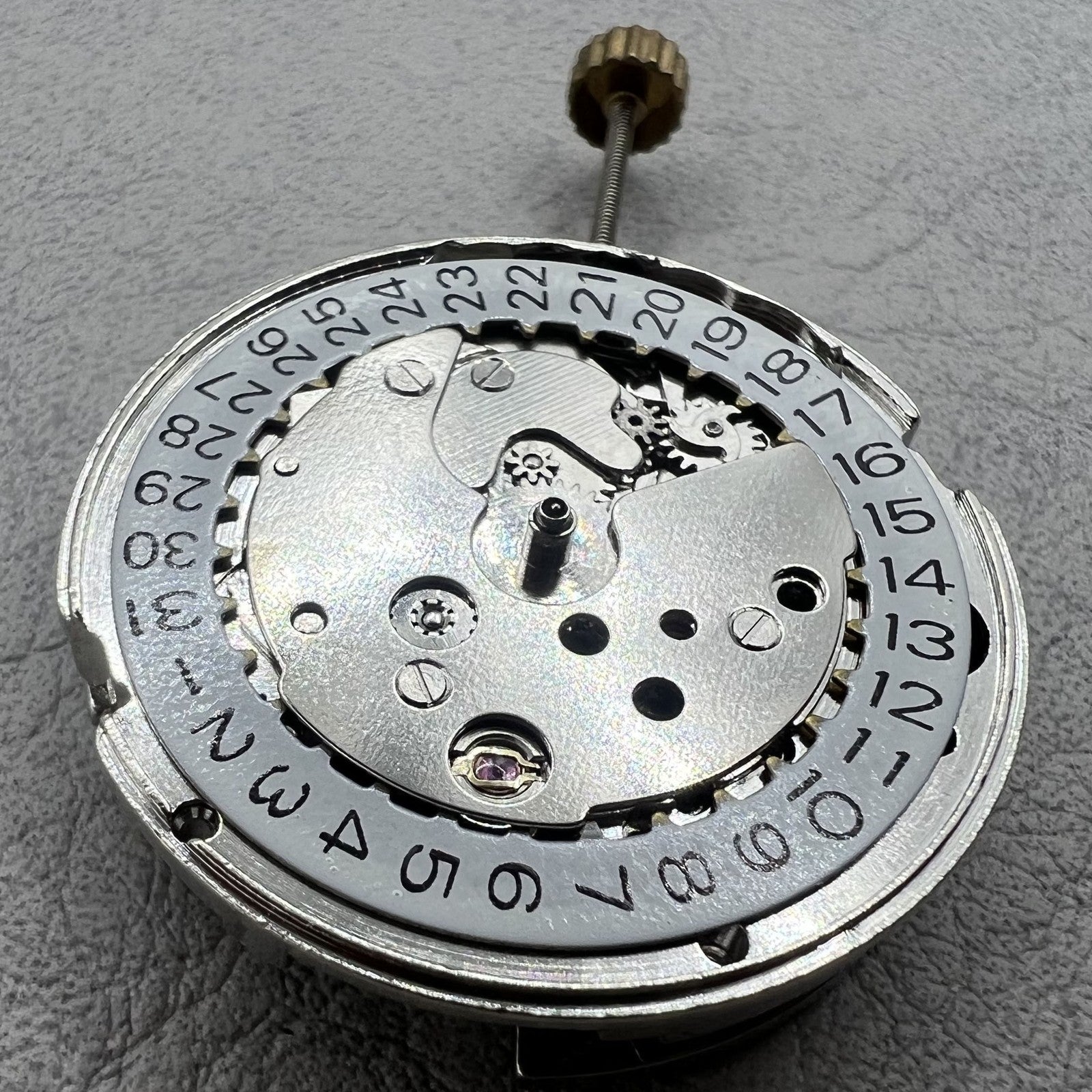 Dandong 7120 watch accessory displaying automatic mechanical movement with single calendar function.
