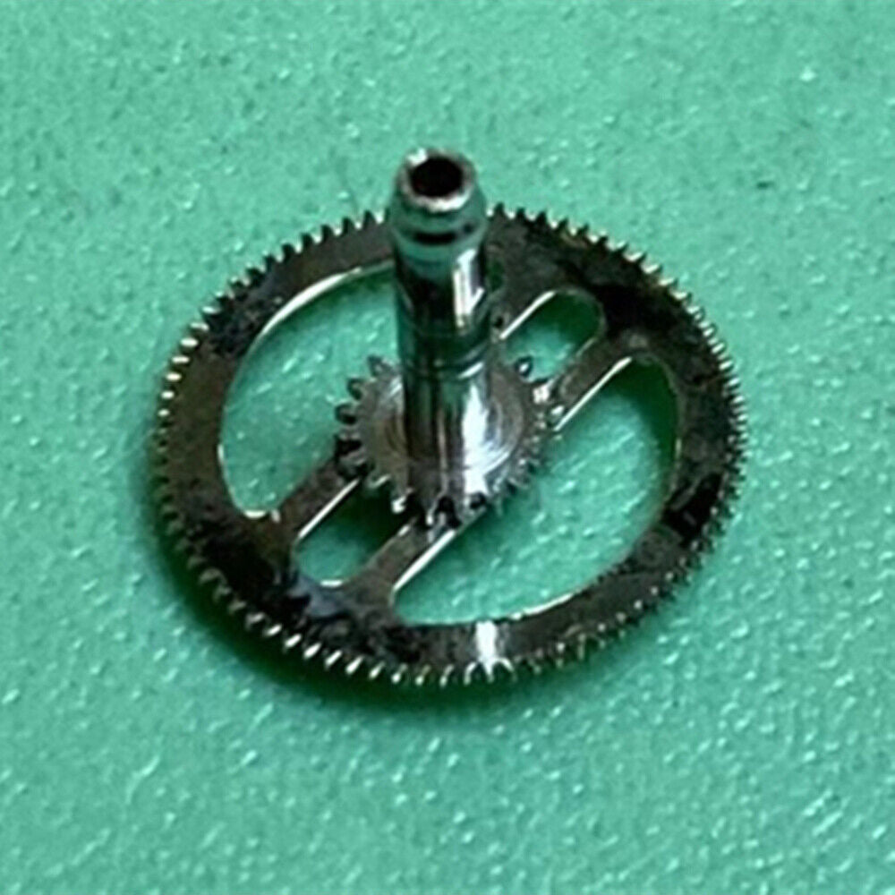 Swiss Cannon pinion and driving wheel components for ETA C01.211 watch by Swiss Cannon, detailed disassembled view.