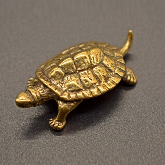 Solid copper longevity turtle figurine with vintage hand-carved bronze detailing, perfect for watch accessory display.