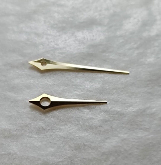 Silver and golden arrow-shaped watch hands set for Epson TMI VJ34 movement, precise timing accessory.
