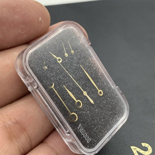 Blue, silver, and gold watch hands set for ETA7751 movement, precise accessory for luxury watch repair